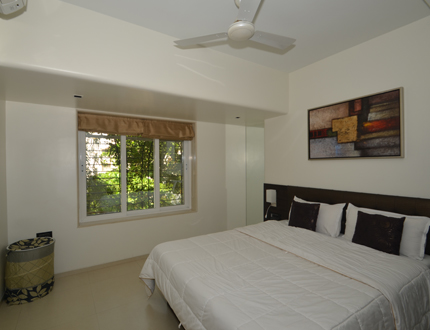 Alcove Service Apartments in Ville Parle East, Mumbai | Bedroom one